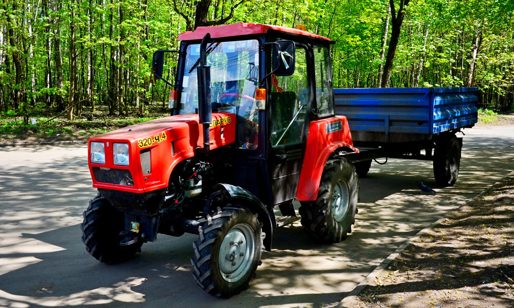 Belarus 320.4 - компактный универсал с системой вакуумной очистки: технический анализ эксплуатационной эффективности