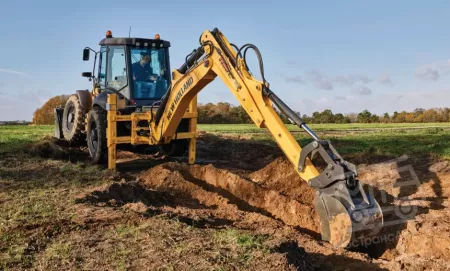 Аренда экскаватора-погрузчика New Holland B115B