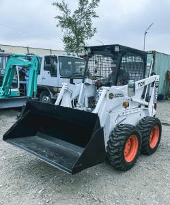 Колесный мини-погрузчик TCM Bobcat 725