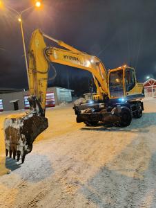 Услуги колесного экскаватора HYUNDAI 180W-9s
