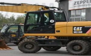 Колесный экскаватор Caterpillar M318D