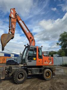 Продам б/у колесный экскаватор Hitachi ZX160W