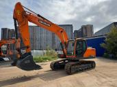 Габаритный экскаватор Develon Dx180LC